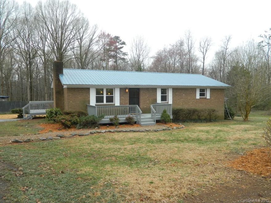 Come see this better than new, newly remodeled home.  Gleaming wood floors, new ceramic tiled kitchen and baths, new stainless steel appliance, fresh paint, custom back splashes and more.  Scenic peaceful country living with Monroe shopping not far off.  Whether you are enjoying the deck or porch in the summer evenings or the feel of a blazing fire in the winter months, this place will truly feel like home.  Owner now offering possible owner financing.