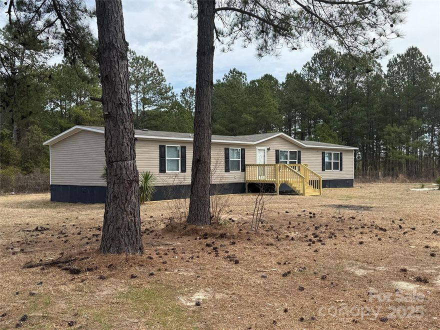 Nice! Large 2.36 Acre Corner Lot! Open Floor Plan with Approximately 1836 Sq Ft of Living Space! 2019 Year Model Manufactured Home. Living Room, Den, Island Kitchen with New Appliances. 4 Bedrooms, 2 Full Baths! Central Heat and Air,  Permanent Foundation, Public Water, Private Septic. Lot is Partially Wooded with Large Cleared Homesite Area.