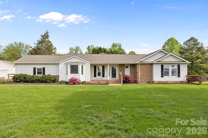 Located on over 1 acre of land, this well-maintained ranch offers the perfect blend of comfort, functionality, and room to breathe.
Step inside to find a thoughtfully designed single-level layout with generous living spaces, abundant natural light, and a warm, inviting feel throughout. With over 2,200 sq ft, there is plenty of room to spread out. Enjoy 3 bedrooms, 2 full baths, a cozy living room with fireplace, dedicated dining room, and an oversized bonus room with endless possibilities. All bedrooms have walk-in closets with upgraded shelving.
Outside you will find a spacious tree-lined backyard. Relax on the back deck or take advantage of the open space—perfect for recreation, gardening, and entertaining. Gather around the firepit on cool evenings and enjoy a variety of fruit this summer from berry bushes and a fig and peach tree. Playground and tree swings will remain!
One of the standout features of this home is the heated and cooled detached garage/workshop that is perfect for hobbyists, storage, or protecting your car from the elements. Whether you are into woodworking, car projects, or just want a dedicated workshop, this is a valuable addition!
If you have been searching for a move-in ready property with space and versatility, this one checks all the boxes. This wonderful home provides a peaceful setting while still offering convenient access to everything the greater Charlotte area has to offer. Walk to the high school and middle school(next year) and just a few minutes drive to the elementary school. No hoa!