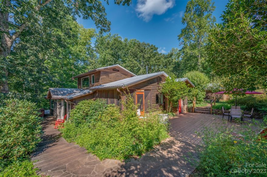 Once in a while, one may chance upon a place that entreats you to stay. This wonderful, somewhat eccentric home is snug within its 9.2 acres of mixed woodland and pasture. The 2,224 square feet of living space are divided between three slightly different levels as though the house grew from the gentle lay of the land. Generous outdoor living spaces embrace it. The interior has an earthy ambiance complimented by a combination of cork, wood, and brick floors and some whimsical accents. The galley-style kitchen, dining area, and living room share a discreet openness. Two wood-fired stoves, a classic cast iron Waterford Stanley cookstove, and a Jotul in the living room augment the passive solar design. The house has a new roof and new energy-efficient windows and doors. The pastures have two run-in shelters that can accommodate two equines. There is also a 24x40 steel utility building. There are trails on the property and throughout the neighborhood. Shopping is within a 15-minute drive.