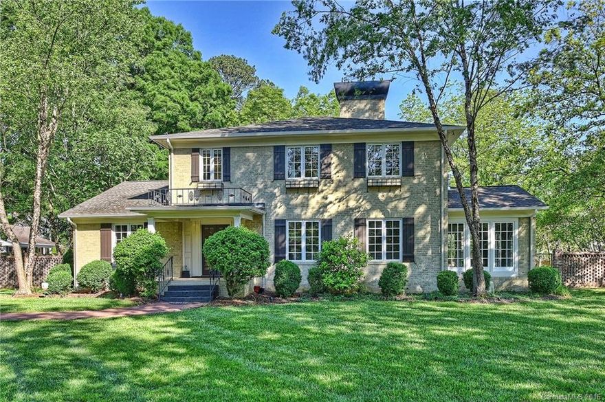 Own a private Eastover compound minutes from Uptown. Fab home on over an acre, level, heavily landscaped lot. Recently refin'd HW flring & painting thruout. Updated eat-in KT w/granite tops, tile backsplash, SS appls & center island. Lovely formal areas, all BTs updated, sunroom & scrn'd-in porch. Lrg mstr up w/new closets. Sep guest cottage blt in 2004 w/it's own living area, KT, full BT & laundry. 3 gas frpls. Property secured by electronic gates. Amazing expansion possibilities.