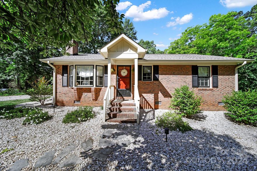 Super all-brick home nestled on 1.35 acres, enveloped by a lush landscape of towering trees, offering unparalleled privacy. Step inside to find a welcoming interior with low maintenance laminate wood floors and ample natural light. The eat in kitchen has space for large table PLUS lots of cabinets and counter tops. The primary bedroom has en suite bathroom and walk in closet. The living room / great room is large enough to have flexible furniture arrangements and still have a sense of openness. The full length screened porch offers an unobstructed view of the beautiful wooded, private backyard to enjoy your morning coffee or evening glass of wine. This idyllic retreat seamlessly combines comfort, charm, and natural beauty. Property is located minutes from interstates, shopping, schools, medical facilities and less than 35 minutes to the airport. Home is immaculate, lot is beautifully wooded and incredibly private and must be seen to be believed. All for less than $330K?!?! Call TODAY!