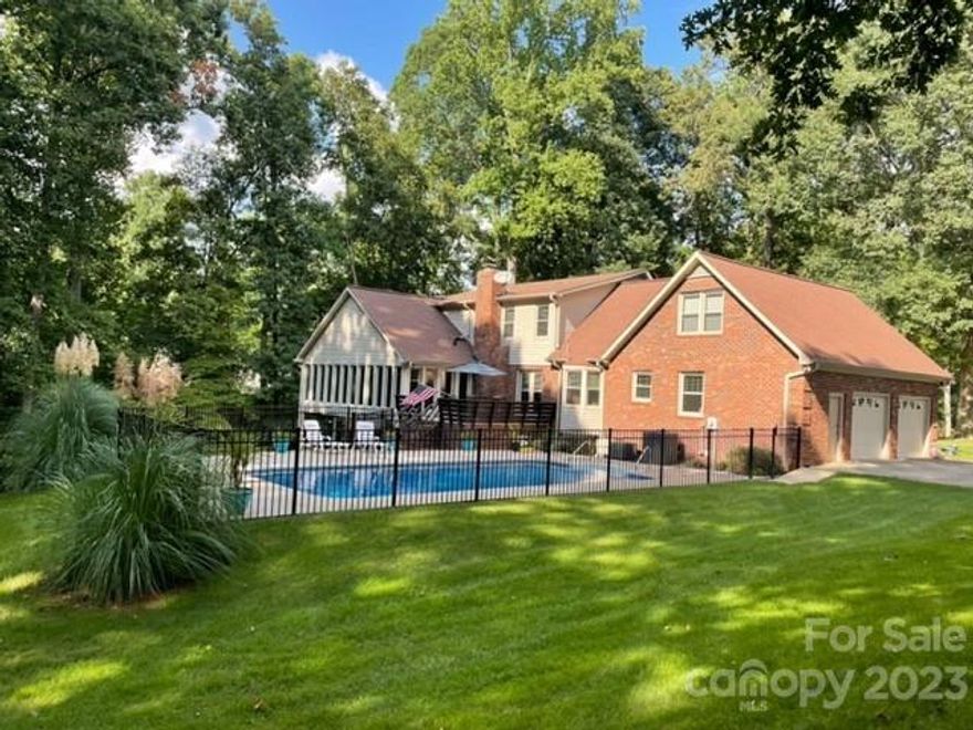 Newly updated traditional home on Mallard Head Golf course! This one owner home has recently received a fresh coat of paint throughout the whole house and a new primary bath featuring a large walk-in tiled shower. If you are looking for a quality-built, well cared for, spacious home, for a growing family, this one is it.  Situated on a beautiful golf course in an upscale neighborhood, this all brick traditional home has a formal living room or office, formal dining, kitchen with granite countertops, stainless steel appliances and eat-in breakfast area. The large family room features beautiful hardwood floors, fireplace, built-ins and a huge sunroom with floor to ceiling windows and a brick floor. The primary bedroom and bath are on the main floor. Three additional bedrooms with 2 full baths and an extra large bonus with all newer carpeting are on the upper level. The best of all is a (17x34) swimming pool with diving board, plenty of concrete surround, and wrought iron fenced.