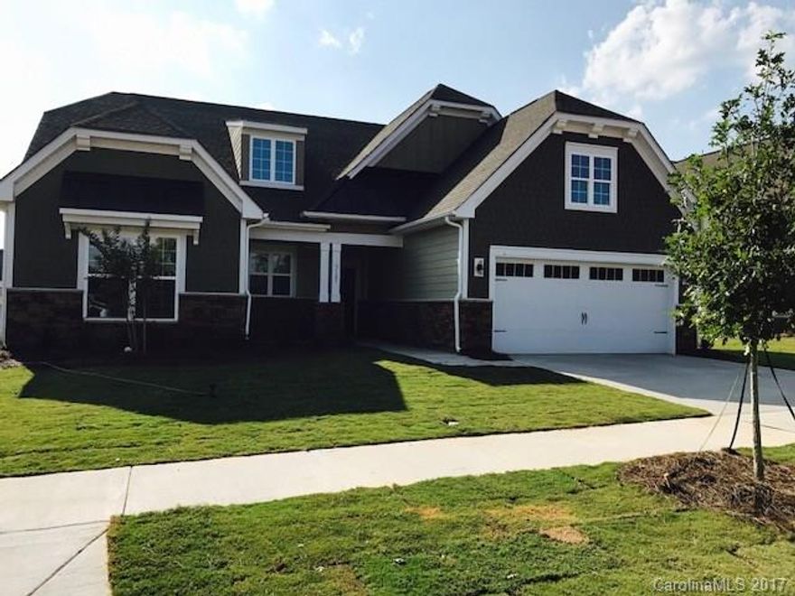 Incredible Gourmet kitchen with double wall ovens,cream cabinets and granite counter tops!  Open floor plan with framed windows and crown molding in foyer, breakfast and master bedroom.  Spacious master with  large walk in closet and tiled, semi-frameless, extended master shower with seat.  Huge bonus room area on 2nd floor and a large screened porch too!!