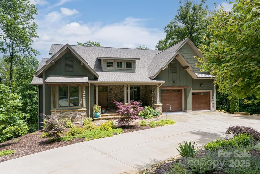 A masterpiece of mountain luxury living with sweeping mountain views in prestigious Kenmure a gated golf course community. Prepare to be captivated by this exquisite home that boasts an array of high-end amenities throughout. Impressive floor to ceiling stone fireplace, vaulted ceilings and well-designed open floor plan leads the way to relaxed luxury living. Attention to details and the finest appointments noted throughout. Main level features include expansive great room w/ stained tongue & groove ceilings opening to dining area, gourmet kitchen w/ high-end appliances, quartzite countertops & walk-in pantry, study, primary suite w/ sitting area, spa-like bath w/ luxurious amenities, 2 guest BR's, full BA and spacious laundry rm. The lower level features a family room, guest BR, full BA, craft room and huge storage space/unfin bsmt. Fantastic outdoor living options include screened porch, multi-level decking and front porch. Unique private setting, level driveway and amazing views!