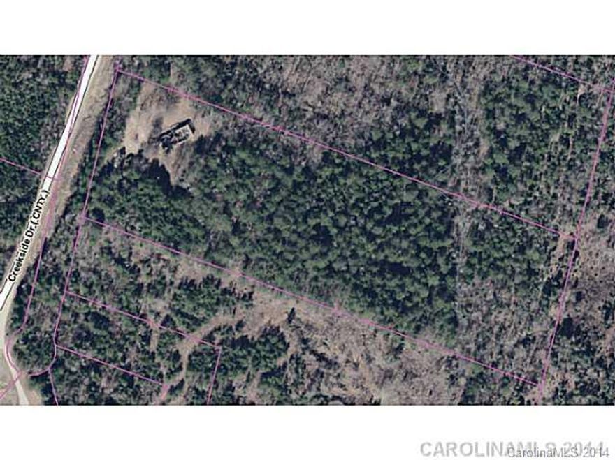 Nice Wooded 7.016 Acre Lot in Orinda Woods.  Storage Building and Concrete Pad on Site.  Well & Septic System on site, but seller does not guarantee if either functions.