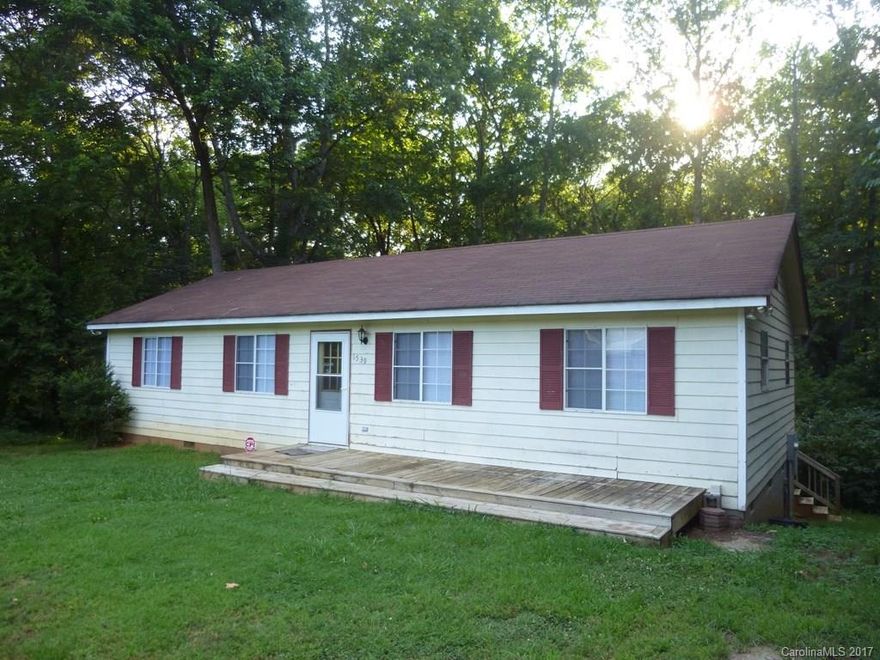 Cute 4 bedroom rental located in Rock Hill close to hospital, shopping and restaurants. This home is nestled in a nice wooded lot at end of a dirt road with stream running through the back.  Brand new HVAC system, freshly painted interior and new laminate floors. A must see, Won't last long!