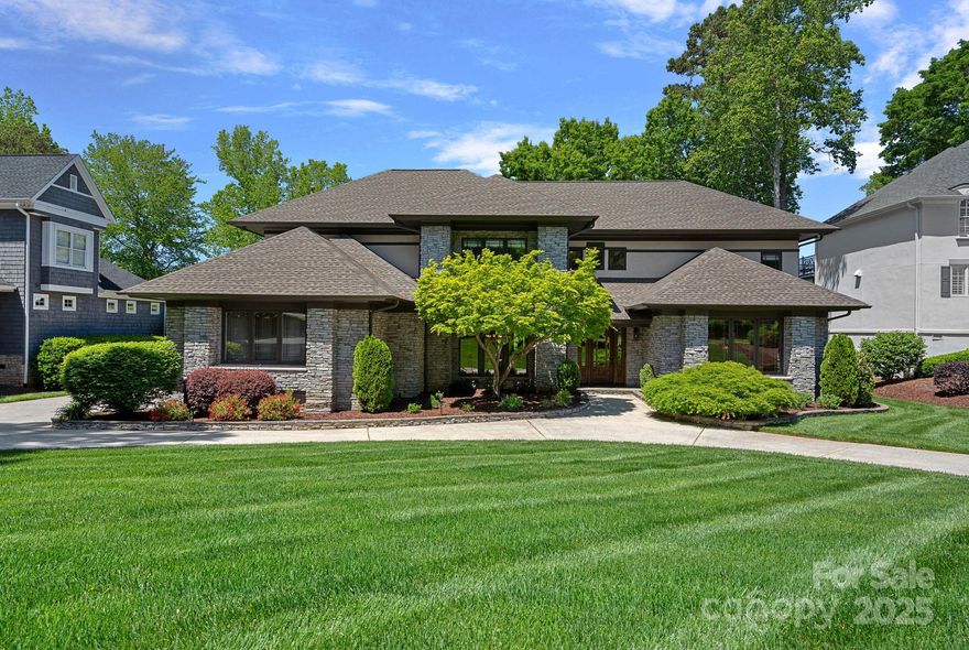 Enjoy River Run Country Club at it's finest on the 18th fairway overlooking the water and club. Did I mention a prime location to watch the 4th of July fireworks? Redesigned by John Bishop this Frank Lloyd Wright inspired home offers endless possibilities. The home has been fully updated including the Chef's Kitchen and all Baths. The features are top notch. Home offers Office, Formal Dining, Two Story Great room and a wine cellar. Kitchen is impressive with Thermador Induction cooktop, steam and convection wall ovens, paneled Fridge and 2 pantries. The Primary Bed is on Main with a Resort Bathroom featuring a Tub that heats, lights, and aerates. Shower has rainforest, jets, and wand. Dual Closets. Upper level offers 3 more substantial bedrooms, one with Ensuite Bath and a Bonus room overlooking the 18th and clubhouse. Outdoor living is abundant with large covered porch, built in grill, bar area and natural gas fire pit. 3 car garage and circle drive.