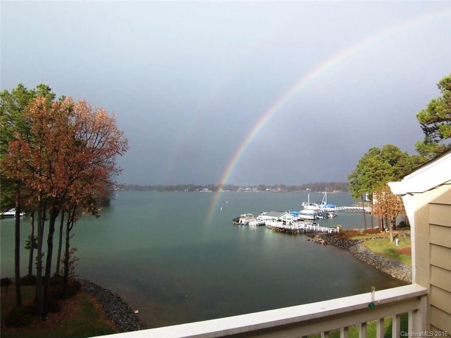Vacation living every day in this beautiful 3BR & 2BA penthouse end unit condo w/boat slip#2 w/lift. Huge deck w/gorgeou deep water views of Lake Norman from master BR kitchen w/solid surface counter tops & greatroom w/fireplace. Many recent upgrades include re-finished H/W floors in living areas new microwave, dishwasher, master bath vanity w/two sinks & faucets, new carpet, fresh neutral paint & smooth ceilings. Separate laundry room, two separate walk in storage areas, ready for quick closing