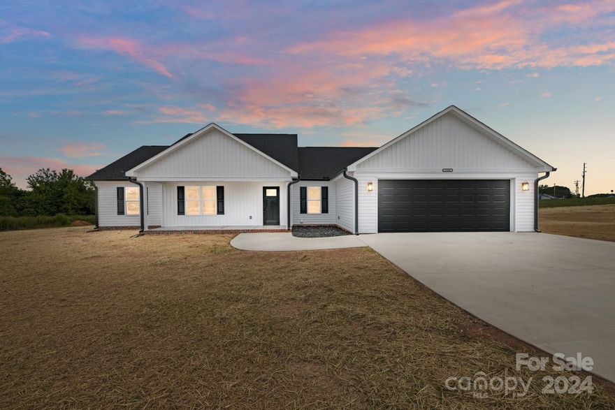 NEW CONSTRUCTION! RANCH HOME SITUATED ON 2.744 ACRES (Level Entry and Level Acreage)! This BEAUTIFULLY designed custom home has an open floorplan concept. The Kitchen is STUNNING with black leather granite countertops, white custom cabinetary and an island.  NEW LVP flooring throughout this home (no carpet). Primary bedroom is GREAT size which features two huge walk-in closets. The primary bathroom features black granite tops with dual sinks an amazing walk-in shower and personal vanity. You will find bedroom 2 & 3 on the opposite side of the primary with another full bathroom. You do NOT want to miss the covered front porch and back covered porch, great for relaxing after a hard days work or entertaining. No Steps To Climb! Come see this one today! HUGE LOT almost 3 Acres! There is plenty of room for a pool, RV, camper(s), detached garage, horses, barn and so much more. The possiblities are endless. No Restrictions!!! No HOA!! This home is located in the North Lincoln School District.