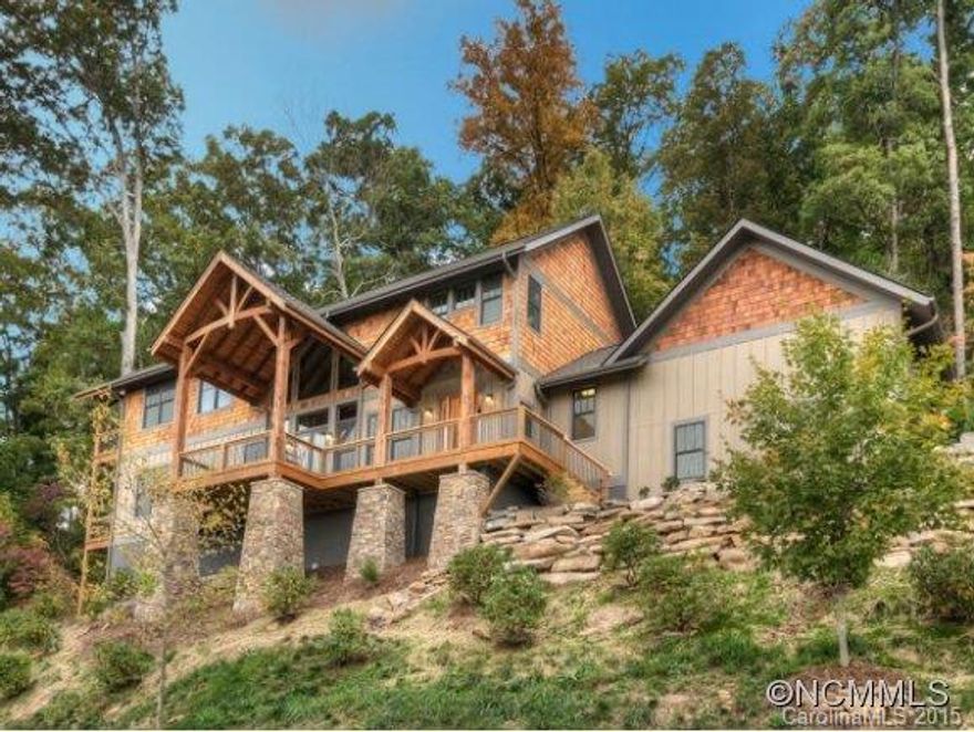 Stunning 2014 Parade of Homes CRAFTSMANSHIP AWARD WINNER. Healthy Built and Energy Star Certified. Long Range Year Round Views, Open Plan, Locally Quarried Stone. 2 Master Suites & Guest Quarters. Privacy, Proximity & All City Svcs including City Water, City Sewer and Natural Gas. 3 Miles to Downtown and 2 Miles to Asheville Mall & New Whole Foods. Built by Asheville Home Builders Association "Builder of the Year," Osada Construction. Taxes TBD.