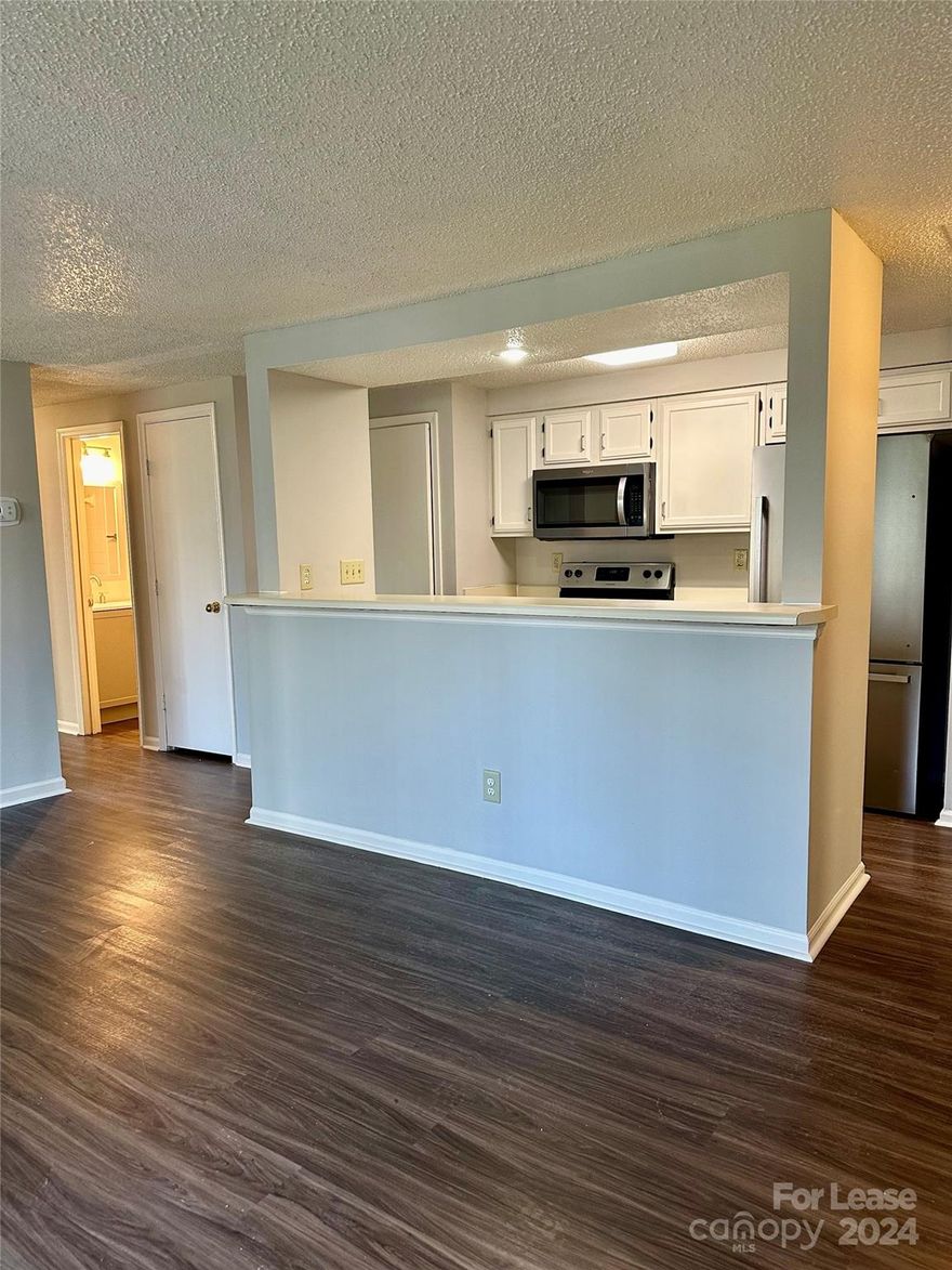 First-floor 3-bedroom 2 -bathroom ready now. Fresh neutral paint throughout, gorgeous LVP flooring and large double sliders in the living room that allow an abundance of light in. Kitchen equipped with updated appliances, white cabinetry and plenty of counter space. Bedrooms are a generous size with amble storage. This community is close to everything! Apartment is bright, spacious and airy!