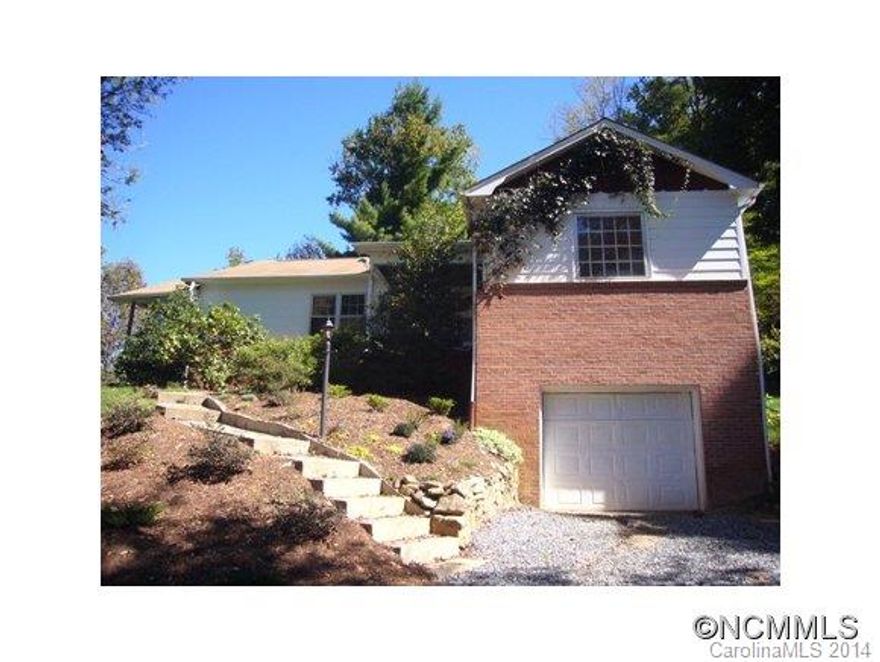 MOUNTAIN VIEWS IN THIS PRIVATE, NEWLY PAINTED HOME WITH ORIGINAL CHARM. REFINISHED FLOORS, NEWER ROOF, NEW HEATING AND AC. NEW BATHROOM, NEW LANDSCAPING, AND GRAVEL DRIVE. BRICK FP IN LARGE LIVING ROOM, LARGE EAT IN KITCHEN. 3 BEDROOMS PLUS AN OFFICE ALL ON MAIN LEVEL. ORIGINAL BEADBOARD WALLS BASEMENT HAS WORKSHOP AREA, READY FOR YOUR WOOD STOVE LARGE COVERED PORCH TO ENJOY THE OUTDOORS.2 SMALLER COVERED  PORCHES UNDER  30MIN. TO DWNT ASHEVILLE