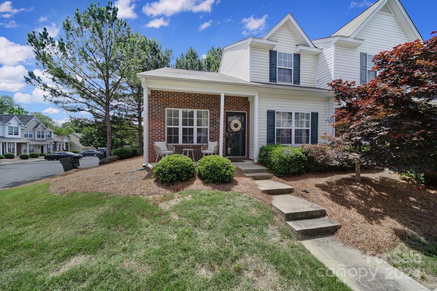 Welcome home to this quaint townhome! This end unit townhome has the owner's suite downstairs off of the main living area. There is laminated vinyl plank flooring throughout the entire downstairs. The laundry room is also located downstairs. Upstairs resides the second bedroom and a loft that can be used as a bedroom/office as it has a very spacious walk in closet. The kitchen downstairs has a large island for storage or space to eat.  The neighborhood has a community swimming pool and playground.  Located close to I-77, restaurants, retail shops, and more! Come see what this home has to offer!