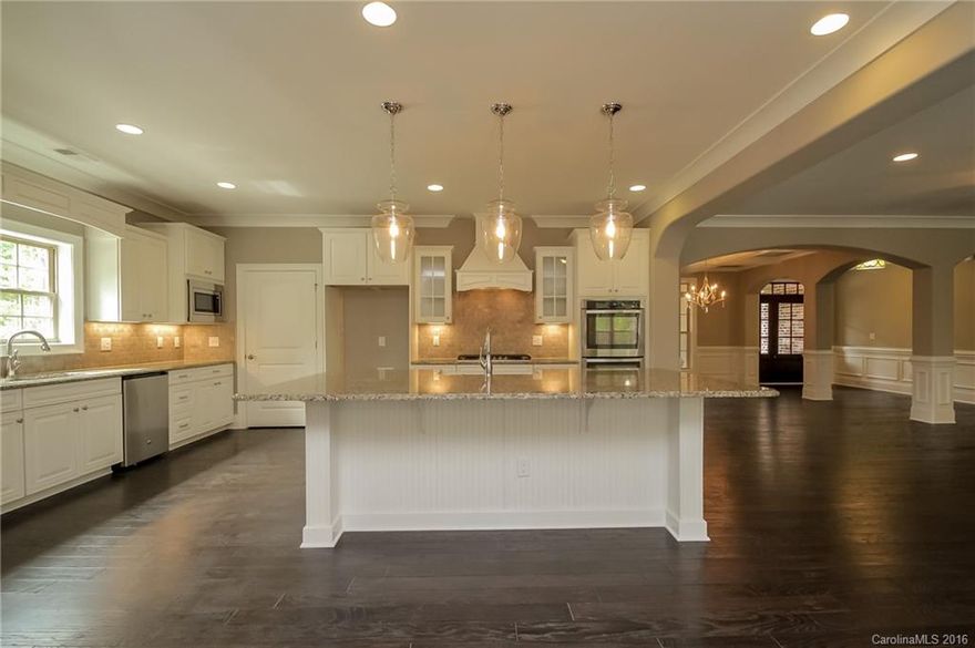 Sophisticated new construction ranch home in Prestigious Pebble Bay!  Open floor plan w/attention to detail throughout!  Main living area w/wide plank distressed hardwoods, coffered ceiling in DR, gourmet kitchen w/double wall ovens, gas range top, HUGE granite island.  Luxurious Master bath w/walk thru shower, garden tub, enormous WI, guest bdrm w/en-suite & two secondary bdrms share Jack-n-Jill, unfinished bonus over garage. Large, LEVEL yard. Truly a stunning home built to fit your lifestyle!