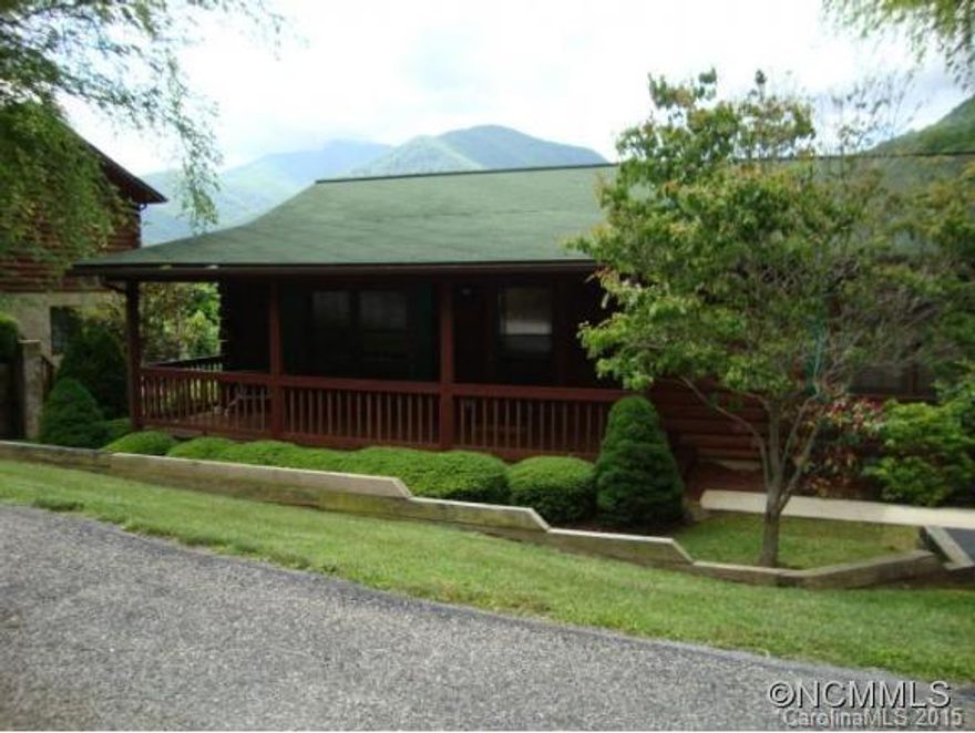 A must see!! 3BR/3BA in great sub-division.  Beautiful well maintained log home with easy access and beautiful mtn views.  City water, city sewer, open back deck and covered front porch. Home being sold completely furnished, all you need is your clothes. A nice year round home or vacation rental.