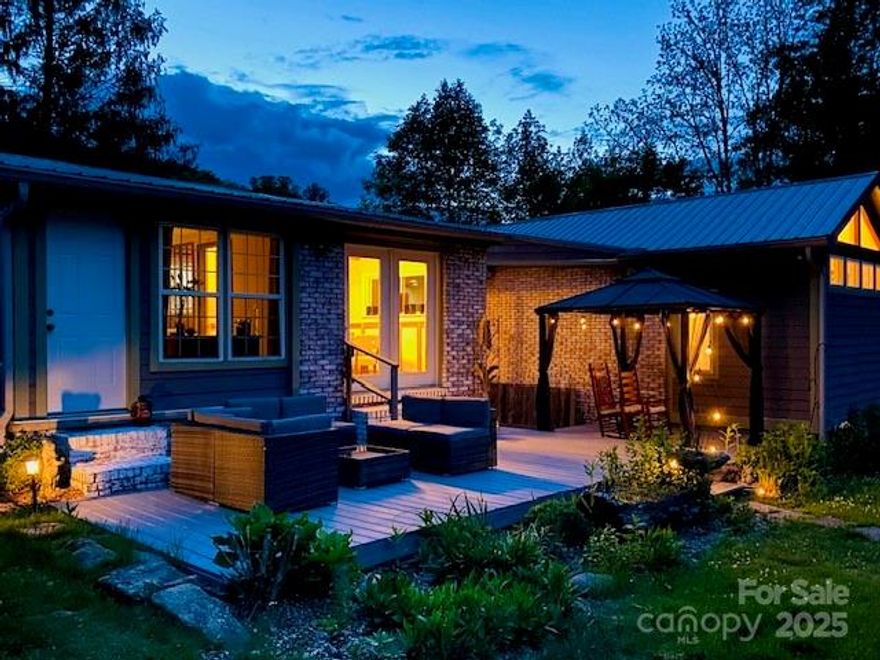 Welcome to 2143 Pisgah Highway, Candler, NC — a charming 4-bedroom, 2-bathroom home offering the perfect retreat. With 1,759 square feet of living space, this home boasts central air conditioning, a cozy fireplace, and a fully equipped kitchen featuring a dishwasher, microwave, and electric oven. Enjoy the convenience of an in-unit washer and dryer.  Outside, relax on your private deck while listening to the peaceful sounds of the nearby creek. The property includes ample driveway space for easy parking.  Nestled near the Pisgah National Forest, this home is ideal for those who love the outdoors. Whether you're exploring scenic trails or enjoying serene water views, this residence offers a tranquil escape where nature meets comfort. Your perfect getaway awaits! 2-1 Buydown Mortgage — "Seller-paid rate buydown available" — ask your Agent.