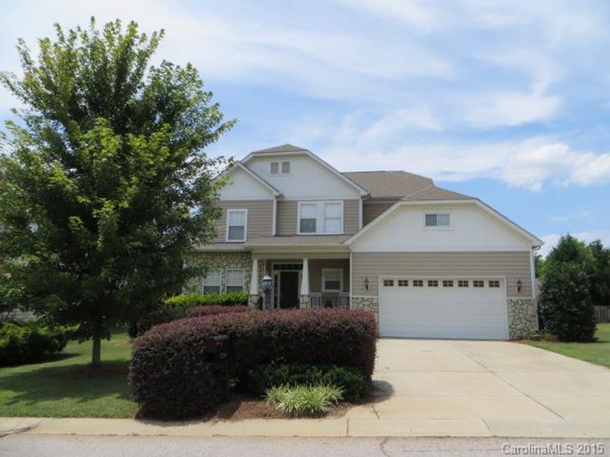 Charming craftsman style home in the award winning Clover School District! Kitchen has tons of cabinet/counter space, ss appliances & built-in desk. Refrigerator included. Spacious Great Room has fireplace. HWs thru main living areas. Master Suite offers a deep WIC & private bath w/ garden tub. Wonderful outdoor living space with large rear deck and fenced backyard. Enjoy the community pool, tennis & walking trails.