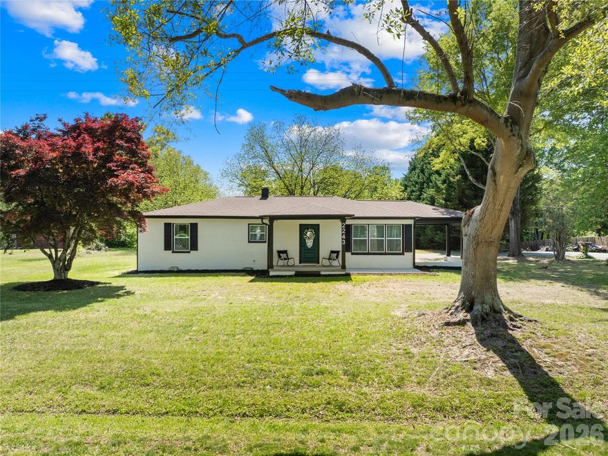 Fully renovated and move-in ready, this all-brick ranch welcomes you with a covered front porch made for rocking chairs, overlooking a beautiful Japanese maple, all set on a spacious 0.50-acre corner lot with NO HOA, just 3 miles from downtown Lincolnton.

Major updates include new HVAC, water heater, electrical, plumbing, windows, septic system, fresh neutral paint, and all-new LVP flooring.

Inside, natural light fills the open living space, where a built-in electric fireplace creates a cozy focal point for movie nights, holiday gatherings, or quiet evenings at home. The redesigned kitchen features 42-inch white soft-close cabinetry, granite countertops, an oversized island, and all-new stainless steel appliances.

Both bathrooms have been updated with tiled showers and clean, modern finishes that complement the home’s fresh, contemporary feel.

Outside, the half-acre lot offers room to spread out, entertain, garden, or create the outdoor setting that fits your lifestyle. Conveniently located with easy access to downtown Lincolnton, Gastonia, and nearby Dallas, this home blends thoughtful updates with everyday convenience. Schedule your showing and experience it in person.