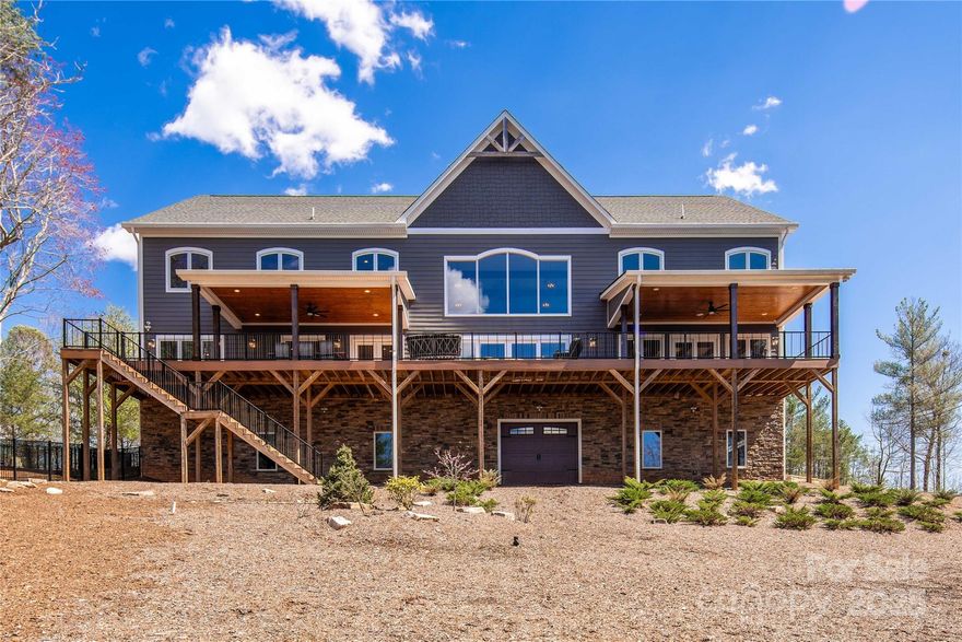 Seller Financing Available for qualified buyers! Experience Fully Furnished Luxury Living in the Blue Ridge Mountains: Welcome to The Dream. This meticulous designed Estate on 25 Acres has ample space for everyone & several more potential home sites to build on to your family compound. Nestled within The Coves Mountain River Club, a private sanctuary with multiple breathtaking views of Table Rock Mountain awaits. Say hello to soaring ceilings, two-story stone fireplace, and floating oak stairs. Expansive windows & french doors seamlessly integrate indoor elegance with the natural beauty outside. The gourmet kitchen is a chef’s dream, featuring a giant butler’s pantry. Retreat to the primary suite, with a spa-like bath with a steam shower, soaking tub, heated floors, and dual walk-in closets. Upstairs find a 2nd primary suite, 3 more bedrooms, 2nd laundry & 3rd full bath. Elevator provides access to all levels, including a massive open basement, offering endless possibilities. Don't miss community amenities! Lodge with pool, gym, fire pit, and community space is about 1 mile away. Gazebo, River access, Equestrian facility, Winery, and Community garden all down near Valley View Gate where you will enter. Motivated seller, bring us an offer and let's make a deal!