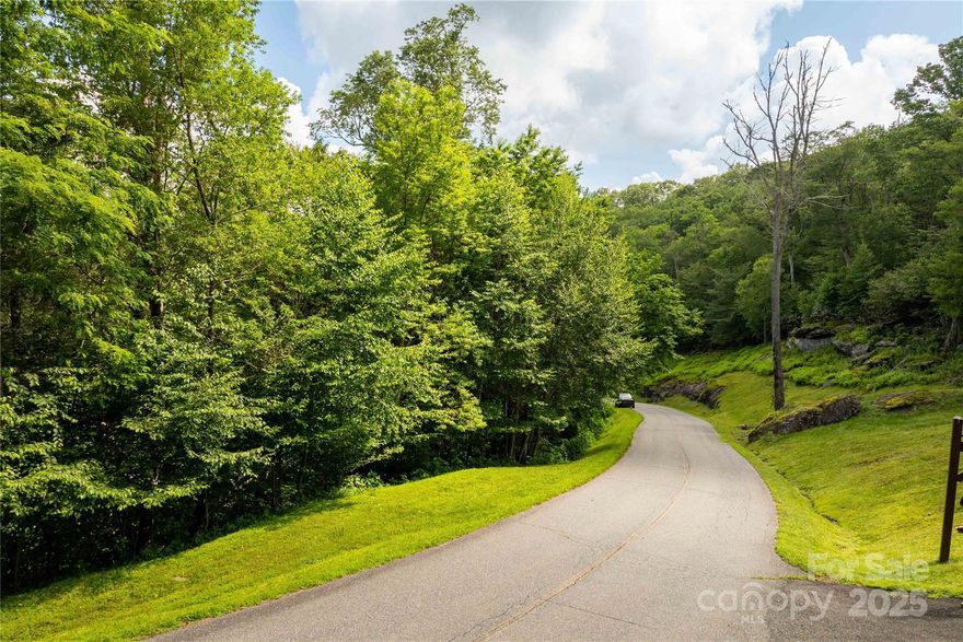 Discover the perfect canvas for your mountain dream home on Lot 108 in Firethorn, one of Blowing Rock’s most sought-after luxury communities. This gently sloping, build-friendly site is tucked among mature hardwoods and offers the potential for long-range views depending on home placement and clearing. The setting provides privacy while being just minutes from downtown Blowing Rock and the Blue Ridge Parkway.

Firethorn residents enjoy premier amenities including a gated entry, trout-stocked stream, private hiking trails, community clubhouse, and picnic areas. With underground utilities, high-speed internet, and paved roads already in place, Firethorn offers the perfect balance of natural beauty and modern convenience. Protective covenants and architectural guidelines preserve both property values and the character of this thoughtfully planned development.

A proposed build by KEEN Building Co. is available for inspiration. Final pricing will be determined by client design and selections; estimated construction costs are $2,346,240 plus lot cost. All plans and designs are subject to HOA approval.

Don’t miss the opportunity to create your dream home in this extraordinary community.