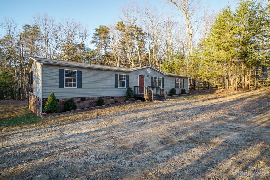 Discover serenity in this charming 3-bedroom, 2-bathroom ranch home nestled on a sprawling .6-acre lot. Boasting an open floor plan, new LVP flooring, carpet, and stainless steel appliances. With a backdrop of lush woods, you'll find peace and privacy right at your doorstep. Looking for modern convenience and peaceful outdoor living, this is the home for you.