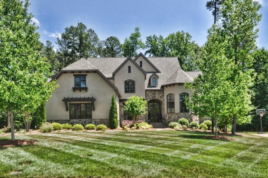Simply stunning home in Weddington School District! Exquisite architecture features in ceilings & millwork.  Gourmet kitchen w/custom cabinetry, granite, stainless appliances include Wolf Gas Cooktop & SubZero Refrigerator. All bathrooms (granite & showers w/frameless doors and tile surround). Media Room & Surround Sound. Garage w/Etched concrete floors & custom cabinets. Sealed Crawlspace. Screened Porch/wooded backyard. Cubby & office area. Unfinished Room w/expansion opportunities. MUST SEE!