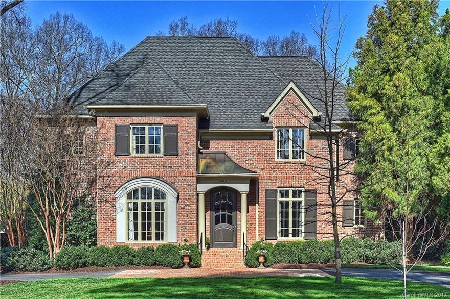 Beautiful home by Elite Builders with gorgeous landscaping. 10' ceilings and wide-cased openings. Lovely kitchen/breakfast open to family room. From here, double French doors flow to the screen porch w/fireplace. Enchanting backyard with a gazebo. Butler's pantry with wet bar. Roomy master suite. Study and guest suite on main. All bedrooms have bath access. Carriage house/full bath over garage. Freshly painted interior. Fine living minutes from SouthPark, Phillips Place/ short commute to Uptown.