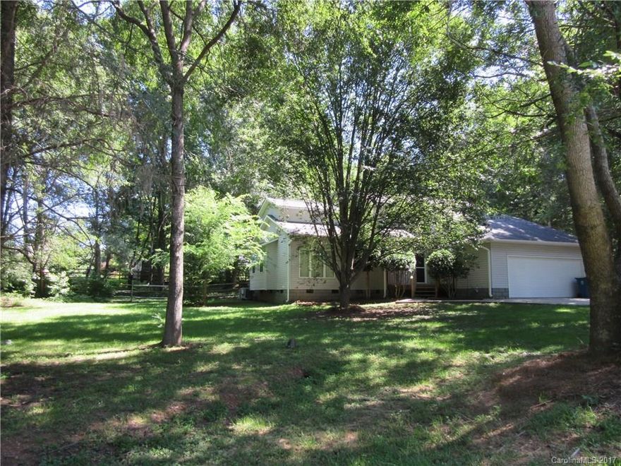 Custom Built Home on acre in West Cabarrus with in ground pool. The kitchen and dining room overlook two story step down great room. There are two bedrooms on main level. Master bed is upstairs with a bonus room and exercise room. The fenced backyard has mature trees, a deck, a pool house and patio area. The downstairs HVAC was replaced in 2016. Make appt. today!