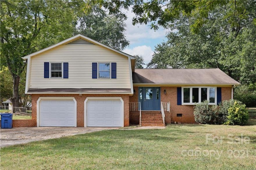 This Mint Hill two-story home offers quartz countertops.