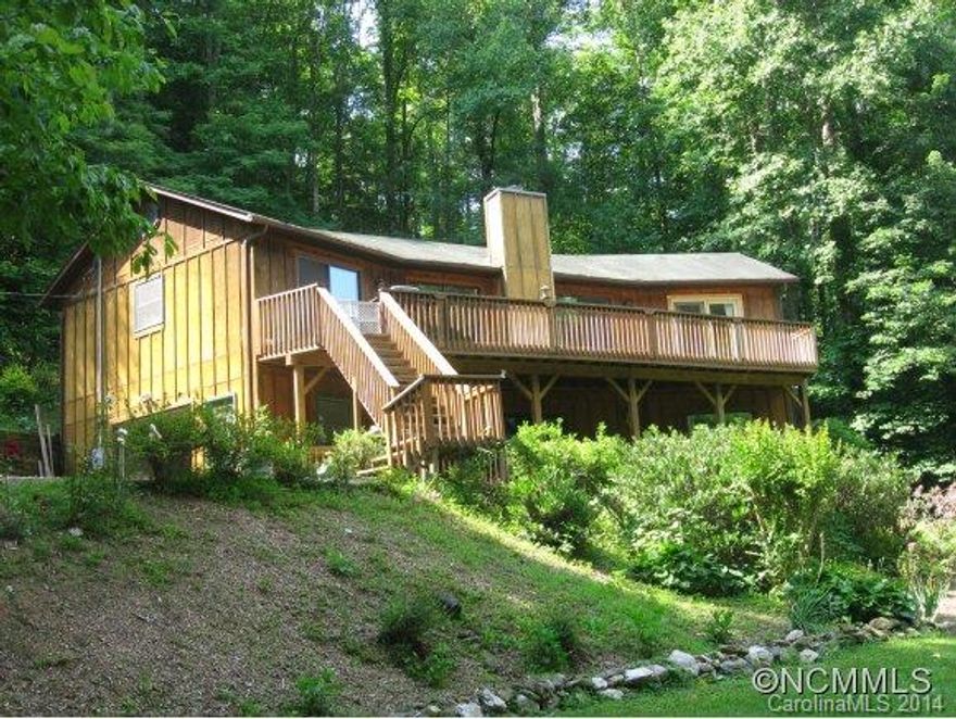 Beautifully updated Home with large Great Room with fireplace. All new interior including flooring, paint, appliances, fixtures, etc. Home includes 2 master suites, family room on lower level, 2 large decks, and a garage with workshop area. There is a good garden area and lots of nice landscaping and also a new private bridge from lower drive way. And as the name suggests: A RUSHING CREEK!!!! MAKE OFFER