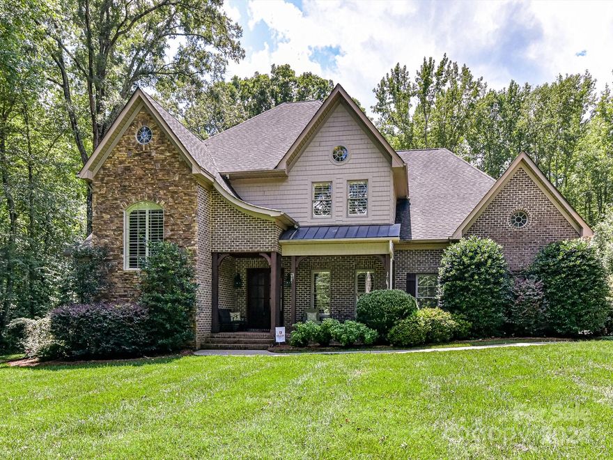 Beautiful 2 story Home on .95 Acre with Inground Pool in Weddington School District.  Lovely Foyer. Formal Dining Room. Stunning 2 Story Great Room with Built-ins., Stone FR, & Coffered Ceiling. Gourmet Granite Kitchen featuring Island & Breakfast Area with Plantation Shutters. Wonderful Primary Bedroom on main with en suite Bath featuring Heated Jacuzzi Tub. Library with High Coffered Ceiling and French Doors. Impressive Media Room with adjacent Entertainment area. Small Office on 2nd. Laundry Room w/sink on main. Heavy Molding, Storage under stairs. Surround Sound on Main inside and out. Irrigation Front & Back. Salt Water Heated Pool w/pool cover & cleaner. Encapsulated Crawl Space with Humidifier. New Dishwasher in 2022, New AC upstairs in 2021, New Garage Doors in 2020. Great Location!