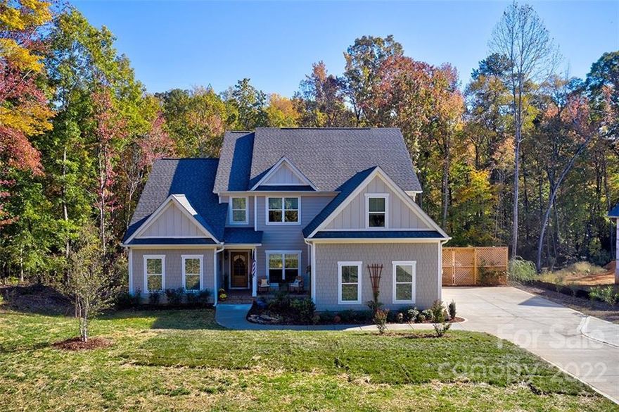 BRAND NEW CONSTRUCTION ON THE LAKE AND CLOSE TO THE BRIDGE FOR COMMUTING!Amazing almost new custom home that builder build for himself with all the bells and whistles.Open floor plan with great room/keeping room/kitchen/dining room combo built for entertaining and opens to beautiful covered porch where you can relax and view the lake in this private cove.Luxury Main floor master suite and spa bathroom with free standing tub and huge shower.Main floor offers office and finished workshop/flex space too. Why work in the garage when you can be inside?The upstairs offers 4 additional bedrooms, second office/homework room,2 full bathrooms and bonus room to accommodate everyone. Lot is non-dockable but sellers launch kayaks, paddle boards, pontoon boat and jet skis.Just off the main channel near north sandbar. Clover schools! WELCOME TO LAKE LIFE!