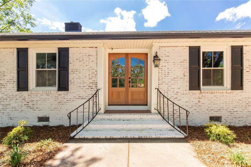 Welcome home to a rare blend of timeless construction and modern transformation—this fully renovated brick ranch on 1 acre offers approximately 2,500 square feet of thoughtfully designed space where comfort, flexibility, and style come together effortlessly.

From the moment you pull into the circular driveway, there’s a sense of arrival. The stately brick exterior and double front entry doors create a warm, inviting first impression that hints at the upgrades waiting inside.

Step through the doors and imagine the rhythm of daily life unfolding. Mornings begin in the beautifully updated kitchen, where granite countertops, an eat-in breakfast area, and bar seating make it easy to sip your coffee, pack lunches, or gather with family before the day begins. Just beyond, the formal dining room is ready to host everything from holiday dinners to casual weeknight meals that turn into lingering conversations.

The spacious living room becomes the heart of the home—perfect for movie nights, game days, or simply unwinding at the end of the day. With fresh paint, new flooring, new windows, and new doors, every space feels crisp, clean, and move-in ready, while upgraded black finishes, wide baseboards, and enhanced trim work add a subtle layer of modern sophistication throughout.

Designed with flexibility in mind, this home features two primary suites, offering an ideal setup for multigenerational living, extended guests, or a private retreat. Each suite provides ample bathroom space and walk-in closets, giving everyone room to spread out and stay organized. Two additional bedrooms and a full bath ensure there’s space for family, guests, a home office, or hobbies.

Step outside and picture weekends spent enjoying your 1-acre lot—whether it’s gardening, entertaining, or simply soaking in the peace and quiet. The 2-car garage and additional outbuilding open the door to endless possibilities: a workshop, storage for equipment, a creative studio, or even your next big project.

Location adds another layer of convenience and lifestyle appeal. Situated within easy reach of Charlotte, Monroe, and Lancaster, commuting, shopping, and dining are all within a comfortable drive. When it’s time to play, you’re just minutes from the excitement of Charlotte Motor Speedway and Carowinds, or the natural beauty of Forty Acre Rock Heritage Preserve and Andrew Jackson State Park.

This home truly delivers the best of both worlds—the solid craftsmanship of a 1960s-built home paired with the updates and finishes today’s buyers are searching for. With its renovated interior, spacious layout, 2 primary suites, and 1-acre setting, this property offers the space, comfort, and versatility to fit a variety of lifestyles.

If you’ve been searching for a move-in ready home near Charlotte with room to grow, this one is ready to welcome you in and make itself part of your story.