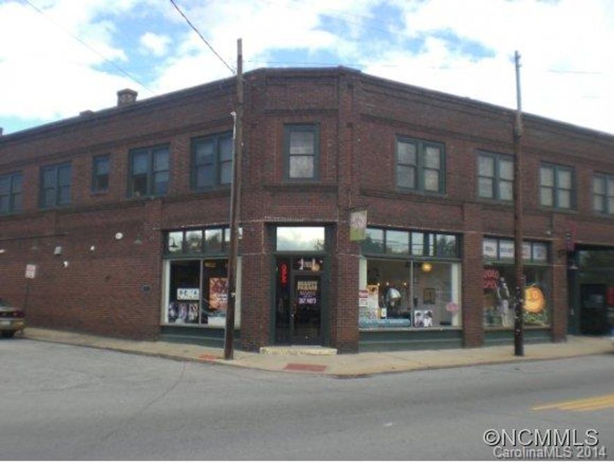 Coveted historic property! The BLEDSOE BLDG (on Nat'l Historic Reg) is the iconic landmark & heart of West Asheville's hip social district! This historically updated 2nd story condo with 7 unique vintage apts. are light-filled, well-maintained, with hardwood floors, skylights, dual-pane windows, security entry, common area deck,& off-street parking. Tenants love this location! Rents increasing! 48 hr notice to show.