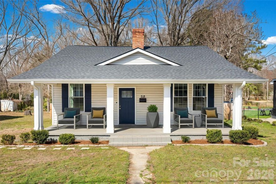 Welcome to 218 Morgan Street, a residence where the timeless character of a 1922 bungalow meets a comprehensive, top-to-bottom renovation completed in 2022. This isn't just a surface level refresh; this home was stripped back and rebuilt from top to bottom for the modern era.  

The interior radiates updated comfort with Luxury Vinyl Plank flooring and elegant crown molding throughout the entire home. The gourmet kitchen serves as the ultimate centerpiece, boasting custom cabinetry, sleek granite countertops, a stylish tile backsplash, and a full suite of nearly-new stainless steel appliances. Functionality is front and center with the addition of a second bathroom, a dedicated pantry, and a convenient new mudroom created from the enclosed back porch.

Beyond the aesthetic upgrades, you’ll find peace of mind in the extensive "behind-the-walls" improvements that were completed in 2022. From all-new electrical wiring and plumbing to a completely new HVAC system, including new ductwork, and a modern water heater.  Every detail of this historic home has been addressed including a new roof installed in 2024.  Outside, the curb appeal shines with new vinyl siding, updated porch columns, and a newly installed fence that fully encloses the back yard.  All of this just moments from the vibrant energy of Old Town Rock Hill.  If you are seeking a historic home with charm and character, coupled with the peace of mind of a recently renovated property, this is absolutely it.