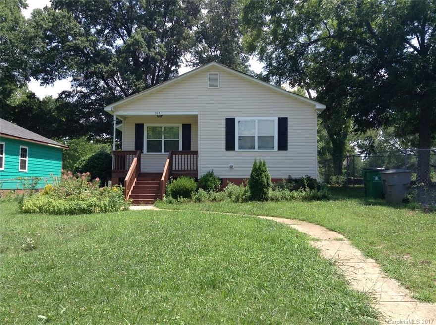 " This 4 bedroom 2 bath home is located close to the uptown area, I-85 & Brookshire Freeway"
Large yard, mature trees in back.