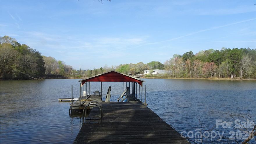 Great Location , Would make the Perfect Weekend Get Away , Buy now , Build Later , Close to all shopping , Stumpy Creek Lake Access , Lake Norman State Park !  This cozy place has been used as a Waterfront Weekend for the last 11 years .  Being Sold As Is , Nice Quite Cove , located close to I -77 at Exit 42 or  Exit 36. The home has been well maintained and is in overall Good condition.