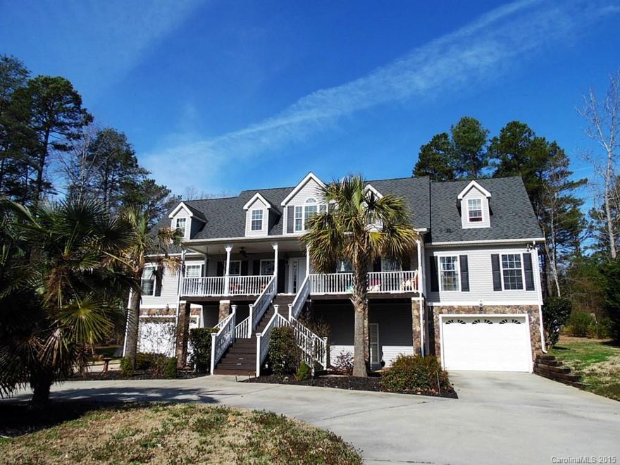 Absolutely gorgeous home w/ peaceful lake views has been tastefully remodeled! High-end finishes and custom details are featured in every room, from the granite kitchen w/ newer appliances to the private master retreat to the spa-like baths. Open floor plan is perfect for entertaining! Enjoy a bbq on the deck w/ pergola or relax on the sprawling front porch. Nearly 1200 extra sq ft in basement is already heated/cooled and can easily be finished w/ endless potential. This beauty won’t disappoint!