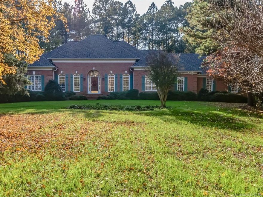 Grand Country Estate in the heart of it all! This Hidden Gem sits on 2 Wooded Acres! Gleaming hardwoods welcome you & are throughout most of the House, with Chunky Moldings & Arched entries to the Prime Living Areas.  GR is warm & inviting with a Wd Burning FP & Blt in Shelving.  Kitchen has solid Maple Cabinets & a Bay Window in BK area overlooking a paver patio.  The Main Hallway is perfect for artwork, w/Master Suite at one end & addl BR's at the other- Office is 4th BR. New Roof 2013.