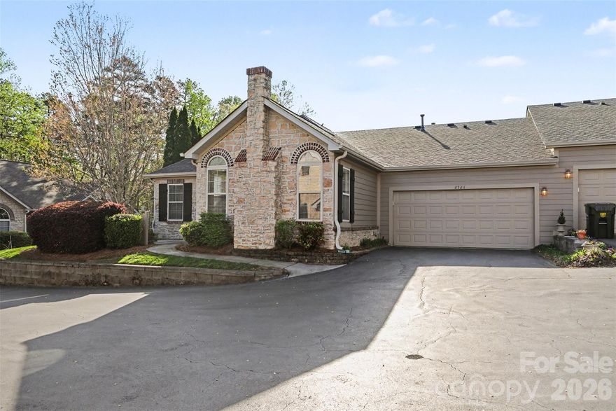 Welcome to 2726 Polo Club Blvd, a beautifully maintained one-story home offering comfort, convenience, and a truly peaceful lifestyle in the heart of Matthews. Tucked away in a quiet, quaint community surrounded by mature trees and lush landscaping, this home provides the perfect blend of privacy and connection. Step inside to find beautiful laminate flooring throughout the main living areas, complemented by tile in the kitchen and bathrooms and cozy carpet in the bedrooms. The sellers have taken exceptional care of the home, making it truly move-in ready. The open-concept kitchen and living area are highlighted by soaring ceilings that create a bright, airy feel, while a cozy gas fireplace serves as the perfect focal point for relaxing evenings. The kitchen also features a convenient breakfast bar, ideal for casual dining or entertaining guests. The spacious primary suite offers a walk-in closet and an easy-access step-in shower, designed for both comfort and functionality. The second bedroom is generously sized and conveniently located near a full hallway bathroom with a tub. A private laundry room is thoughtfully tucked away to minimize noise and maximize functionality. Additional storage is easily accessible via pull-down attic access, providing practical space without sacrificing convenience. Step outside to your private patio and unwind while taking in the tranquil surroundings—perfect for morning coffee or a relaxing evening. This tight-knit community is known for its welcoming atmosphere and frequent social gatherings, making it easy to feel right at home. Enjoy a low-maintenance lifestyle with beautifully maintained landscaping handled by the HOA, along with water and sewer included in the dues. Residents also have access to fantastic amenities including a community pool, fitness center, and clubhouse. Ideally located just 5 minutes from downtown Matthews, 10 minutes from downtown Mint Hill, and only minutes from a variety of grocery stores, shopping, and dining options, this home also offers convenient access to the Levine Senior Center and nearby medical facilities. The home includes a two-car garage and ample additional parking within the community, offering both comfort and convenience in a highly desirable location. Don’t miss the opportunity to own this charming, low-maintenance home in one of Matthews’ most desirable communities!