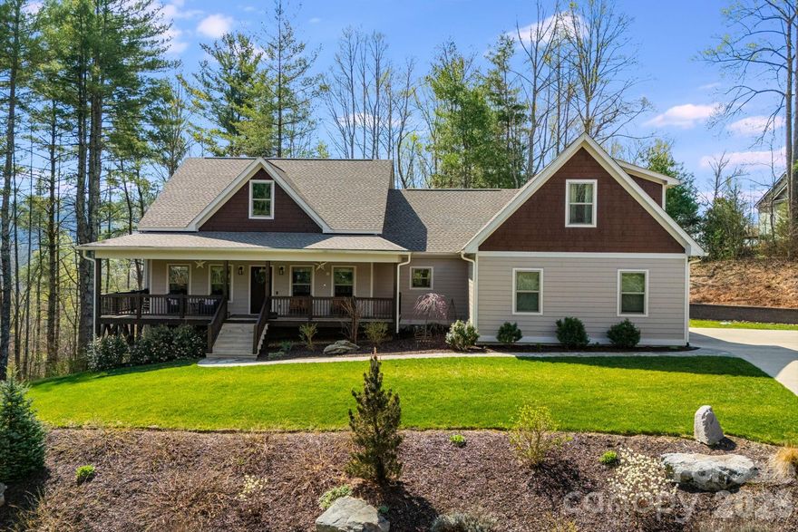Custom-built in 2021, this thoughtfully designed mountain retreat offers a serene setting where you can wake up to the sound of birds and enjoy the beauty of all four seasons. Enjoy a scenic countryside drive as you approach the property, setting the tone for this peaceful mountain setting. Featuring 3BR/2.5BA and an open floor plan, the home includes a spacious primary ensuite and a neutral color palette and quality finishes throughout. A versatile bonus room with a half bath provides ideal space for guests, a home office, or hobby area. Outdoor features include a concrete driveway, flagstone walk, and beautifully landscaped grounds that complement the natural surroundings. Take in the southeastern winter view from the rear of the home or enjoy the peaceful setting year-round. Located in a neighborhood of well-maintained, desirable homes with access to a community pool set beside a picturesque mountain stream. Whole-house Generac generator conveys for added peace of mind.