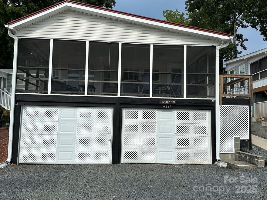 Enjoy Lake Views from This Charming Park Model Home in Badin Shores Resort! Take in the beautiful lake view from the comfort of your covered and screened-in porch at this 3-bedroom, 1.5-bath park model home with a spacious room addition. Located in the gated community of Badin Shores Resort, this home offers a smart layout with bedrooms on each end, creating a bright, open-concept space for the kitchen, dining, and living areas. Features include fresh paint, updated flooring in the park model, a washer/dryer, dishwasher, concrete walkway from the parking area, and storage space under the deck. All furniture and décor currently in the home will remain, making it move-in ready or the perfect weekend retreat. Resort amenities include a swimming pool, sandy beach area, waterfront boardwalk, restaurant, clubhouse, playground, basketball courts, putt putt, boat ramp, fishing pier and more—perfect for full-time living or relaxing getaways.