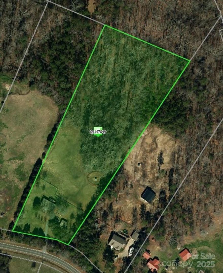 Endless possibilities are offered here on this 6.02-acre parcel, nestled in a highly desirable area with new homes and nearby beautiful horse farms, offering the perfect blend of privacy and potential. The property features an existing manufactured home with utilities in place that could be remodeled or removed—you choose your vision. The majority of property's value is the land so whether you're looking to build your dream private estate, family compound or you're a developer seeking land to subdivide, this is a rare find with incredible upside. Also included is a detached garage/workshop, ideal for the home hobbyist, a cozy man cave, or a stylish she shed. Don't miss your chance to own a slice of the countryside with city conveniences nearby. Bring your vision and make it your own!