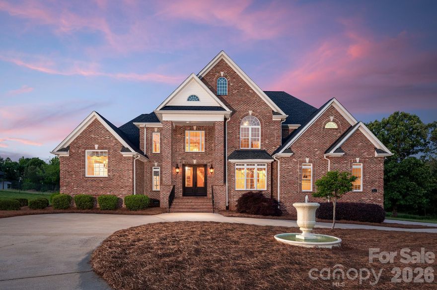 Set on a beautifully landscaped and private 1.9-acre lot, this stately 4BR/3.5BA brick estate is just minutes from Denver’s shopping, dining, and entertainment. A grand two-story foyer with sweeping spiral staircase welcomes you inside, where travertine tile floors and soaring ceilings set the tone for refined living. The main level features two stunning living areas in addition to the primary suite with a spa-like bath and walk-in closets. The updated kitchen showcases granite countertops and custom cabinetry. Throughout the home, hand-applied custom faux-finished walls meticulously crafted by a skilled artist add texture and sophistication. Upstairs, Brazilian cherry hardwood floors bring warmth to the additional bedrooms. Recent upgrades include a new roof (2023) and an epoxied 3-car garage floor. With a circular driveway, generous outdoor space, and an ideal location near all the conveniences of Denver, this home offers the perfect blend of privacy and accessibility.