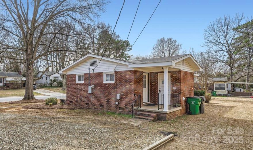 Beautifully updated and move-in ready, this charming home is nestled in the highly convenient Ashley Park neighborhood. Enjoy quick access to Uptown, FreeMore West, the airport, I-85, and I-77, as well as a growing selection of popular local restaurants, bars, and breweries. Inside, the open floor plan is perfect for entertaining, with large windows and stylish updates that bring a fresh, modern feel throughout. The fully remodeled kitchen features all-new stainless steel appliances, quartz countertops, sleek modern cabinetry, and a spacious bar that opens to the living area. With three bedrooms and one beautifully updated bathroom, the home feels larger than the square footage suggests. There’s also plenty of potential to expand, thanks to the large, curved lot—ideal for adding an additional bedroom or bath. Updates extend beyond the kitchen and bath, with improvements to plumbing, electrical, and mechanical systems already in place.