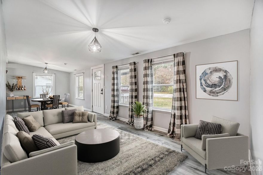 Imagine finding a rare turn-key, beautifully renovated home under $250,000.  Well, you have found it! This sought-after single family home is a three-bedroom, two-bath residence which offers 1,070 square feet of well-designed living on a good-sized lot. Inside, the home is fully renovated with waterfall butcher block countertops, impressive new flooring in 2021, a spacious floor plan and impressive new light fixtures to illuminate it all. Outside, a reinforced concrete driveway has been added with a 30-amp electrical outlet that’s ready for a recreational vehicle. The enhancements continue with a new roof in 2020, a rebuilt and upgraded engineered septic system in 2021 and a new vapor barrier in the crawl space. The barn and pergola come with the house, which has no HOA to deal with. The county has verified there is no permit on file because of the home’s age. It’s ready for your viewing.