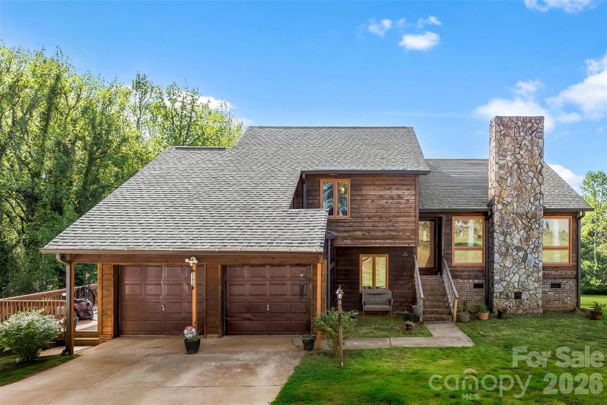 Tucked away off the road on a full acre, this beautiful and unique wood home offers the perfect blend of privacy and charm. Featuring 3 bedrooms and 3 bathrooms, this home welcomes you with a stunning stone fireplace with gas logs—perfect for cozy evenings.

The spacious layout includes a versatile bonus room complete with a wet bar and convenient laundry area, ideal for entertaining or creating your own retreat space. Step outside to a huge deck designed for hosting gatherings, relaxing, and enjoying the peaceful surroundings.

A rare find that combines character, space, and seclusion—this home is truly one of a kind. Be sure to schedule your showing today!