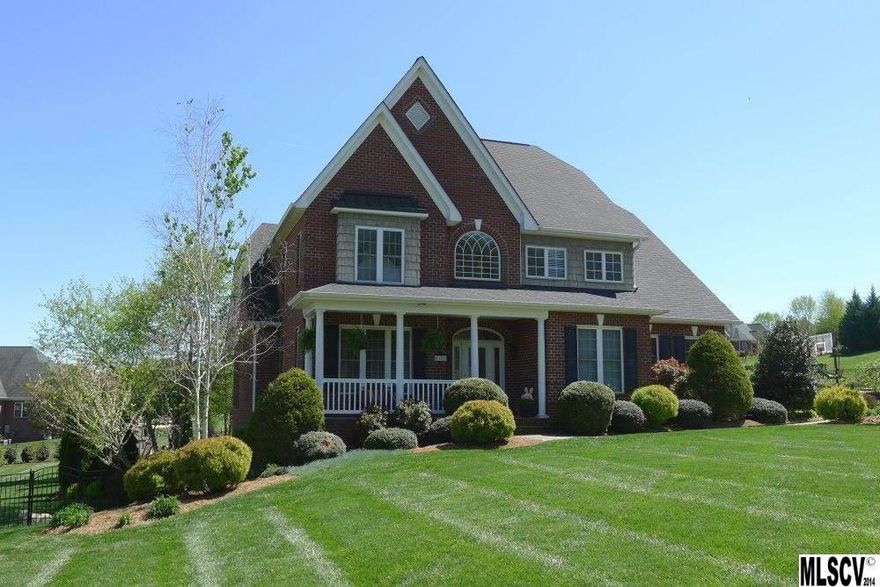 Nestled in the shadow of Baker's Mountain, this stunning 3-level home has everything you could ask for! The main level offers a soaring 2-story foyer opening onto the formal dining room with arched entryways and inlaid wood floors. An adjoining butler's pantry leads to the open kitchen/great room featuring granite countertops, stainless appliances, center island, bar seating, breakfast area, and cozy family space with gas fireplace and door to the rear deck. The main level master suite offers a sitting area and private bath with his/hers vanities, jetted tub, and huge walk-in closet. The 2nd level features two bedrooms sharing a hall bath, & a 3rd bedroom with private bath. The full lower level was built for entertaining, offering a billiards space, wet bar, den, office, full bath, & bonus room. Off the lower patio doors you'll find the amazing outdoor fireplace and patio area, plus a level backyard with professional landscaping and the perfect view of the Baker's Mountain.