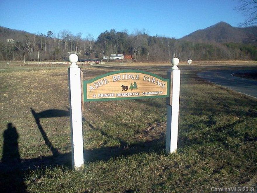 Price reduced! Very beautiful piece of land to build your dream home! No highway noise heard hear but just a short drive to the city.The Ashe Bridge Farms community offers affordable dues ($200 per year) and light restrictions. Camping allowed with certain limitations. Camper and/or equipment must be removed by Jan and returned no earlier than March. Modular and stick build homes allowed. Four acre wooded lot in peaceful subdivision just south of 40. Located a short drive from Marion Wal-mart, hospitals, etc. Also located just minutes to Lake Lure, Black Mountain and Asheville.  This four acre wooded lot offers ample room for building, privacy and peace. Call to schedule your tour today. Cabin rentals available for prospective buyers (restrictions apply-call for more details).